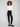 Black slim-leg pants featuring a skinny fit and styled with a white top, highlighting the sleek design by Charlie B.