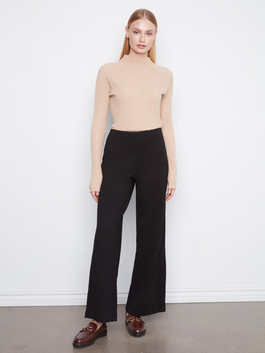 These pants feature a wide leg style, offering a relaxed and stylish fit by Charlie B.