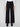 These long black pants offer an elegant look with their extended length and sleek finish by Charlie B.