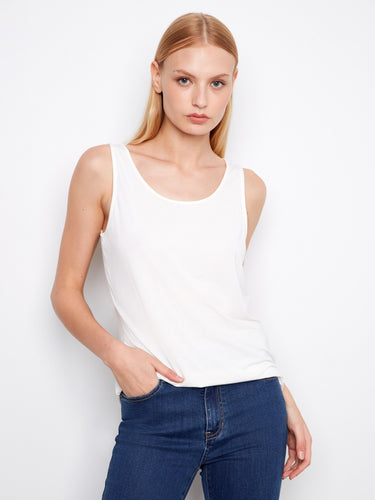White tank top with a reversible design, featuring a scoop neck and relaxed fit. Perfect for versatile styling by Charlie B.