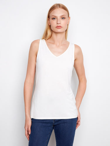 Elegant white tank top showcasing a V-neck and relaxed fit, ideal for casual or chic looks by Charlie B.