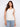 This versatile top features a reversible design, offering both style and functionality for any occasion. By Charlie B.