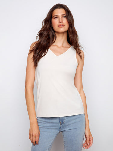 The top showcases a chic V-neck option, adding elegance to its relaxed fit for everyday wear. By Charlie B.