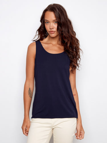 Navy top featuring a reversible design for versatile styling, perfect for any occasion. Crafted with care by Charlie B.
