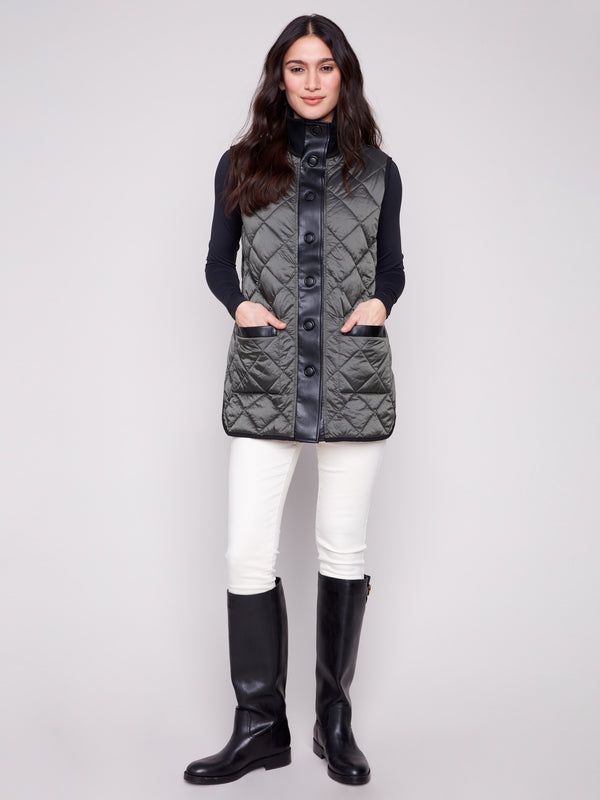 Spruce quilted vest with button front closure, showcasing a versatile reversible design by Charlie B.