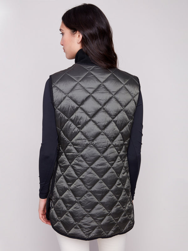 Quilted spruce vest featuring a cozy texture and functional patch pockets for everyday wear by Charlie B.