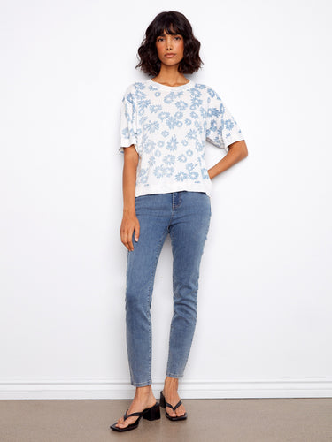 Enjoy the soft, breathable feel of this 100% cotton floral top, ideal for any season and easy to pair with jeans. By Charlie B.