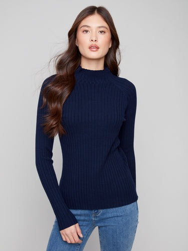 Chic navy ribbed knit sweater offering long sleeves for added comfort and style by Charlie B.