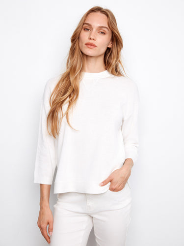 White cotton sweater with a crew neckline and 3/4 sleeves, perfect for casual wear by Charlie B.