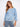 This blue top features a classic crew neckline, perfect for casual outings. Made from 100% cotton for ultimate comfort by Charlie B.