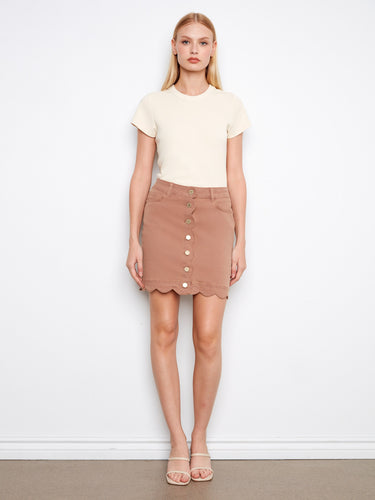 Elegant design with built-in shorts offering comfort and style in one piece. By Charlie B.