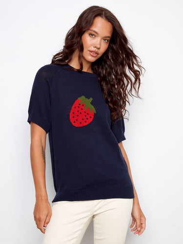 Navy sweater with a playful strawberry design, featuring a classic crew neckline in 100% cotton for comfort. By Charlie B.