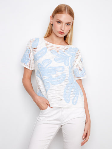 White crochet sweater with a leaves pattern, featuring a relaxed fit for comfort by Charlie B.
