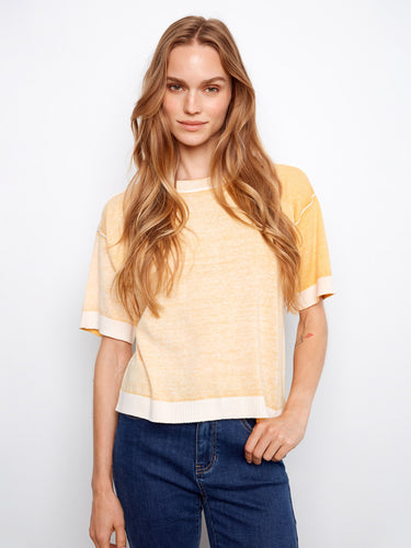 Yellow top with a crew neck and relaxed fit, crafted from 100% cotton for ultimate comfort. Designed by Charlie B.