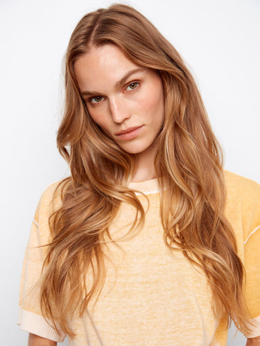 Soft yellow tee with a relaxed fit, ideal for laid-back days and effortless styling. Crafted by Charlie B.