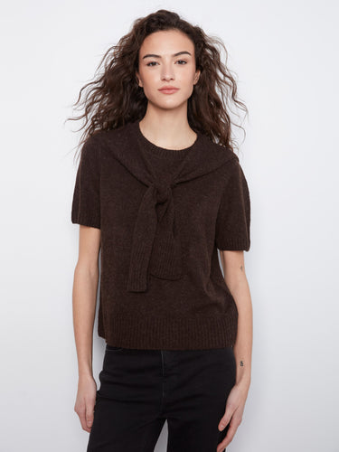 The sweater features a classic crew neckline, adding a touch of elegance to its design by Charlie B.