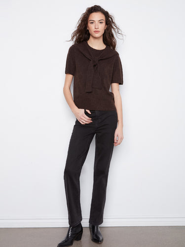 An attached sweater detail gives this piece a unique and fashionable twist, ideal for layering by Charlie B.