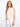 Natural linen-blend top featuring a sleeveless design and drawcord hem, perfect for layering or wearing alone by Charlie B.