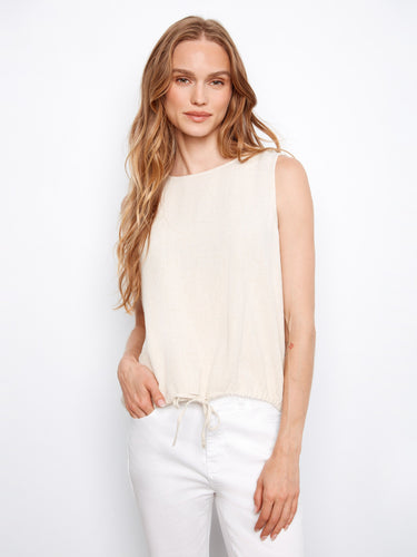 Natural linen-blend top featuring a sleeveless design and drawcord hem, perfect for layering or wearing alone by Charlie B.