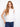 White linen top featuring a high-low hem and side button detailing for a chic look by Charlie B.