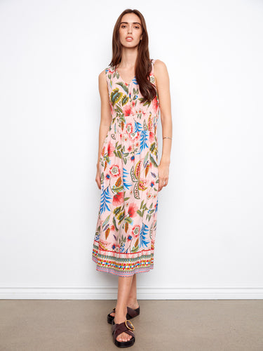 Floral dress with a flattering V-neckline, perfect for any occasion. The vibrant pattern adds a touch of elegance by Charlie B.