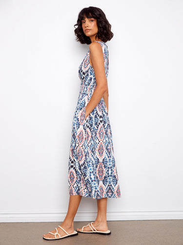 The wide straps on this dress provide support and add to the overall chic look, perfect for sunny days out. By Charlie B.