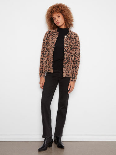 Leopard print jacket with a cozy soft fuzzy knit, featuring patch pockets and button closure. Styled by Charlie B.