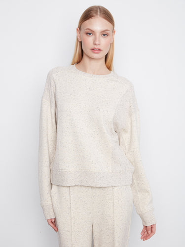 Soft scuba fabric sweatshirt with a crew neck and long sleeves, offering a relaxed fit. Designed by Charlie B.