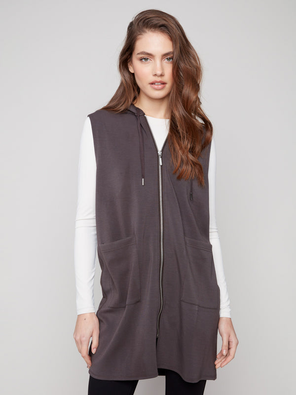 Stylish mocha vest with hood and drawstrings, offering both comfort and fashion-forward design by Charlie B.
