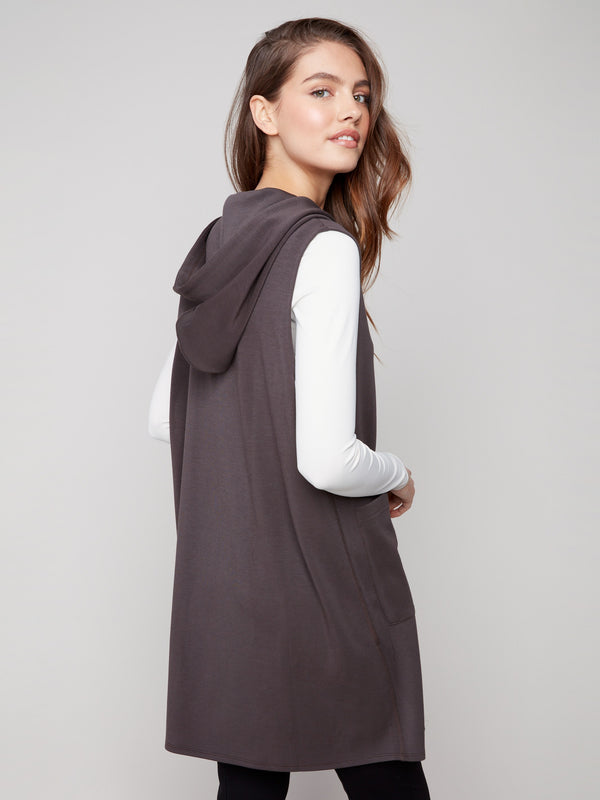 Mocha sleeveless vest showcasing front patch pockets, ideal for adding functionality to your outfit by Charlie B.