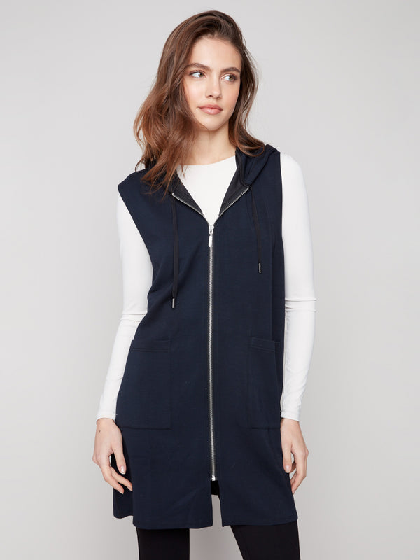 Chic black vest designed with a zip front closure and comfortable hood, ideal for any season by Charlie B.