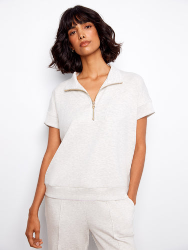 Light grey top featuring a stylish half-zip collar, perfect for a casual look. The short sleeves add comfort by Charlie B.