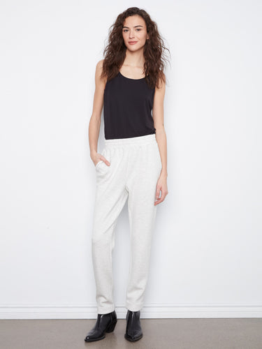 Heather-light grey jogger pants featuring a tapered fit and elastic waistband for comfort, perfect for casual wear by Charlie B.