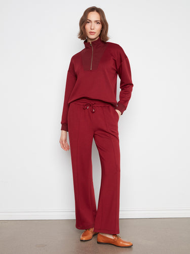 These pants feature a wide leg design, offering comfort and style for any occasion. Perfect for a relaxed yet chic look by Charlie B.