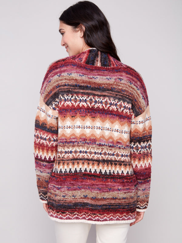 Vibrant Space Dye Jacquard Cardigan highlighted with drop shoulders, creating a relaxed yet chic look by Charlie B.