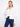 This stylish white jacket boasts button-flap patch pockets for added functionality and flair by Charlie B.