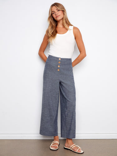 Indigo pants featuring a regular rise and button front, crafted from stretch linen for comfort and style by Charlie B.