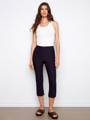 These capri pants feature a slim leg design, offering a chic and modern look. Crafted with attention to detail by Charlie B.