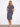 Navy striped dress with a chic boat neckline, showcasing its elegant design and style by Charlie B.