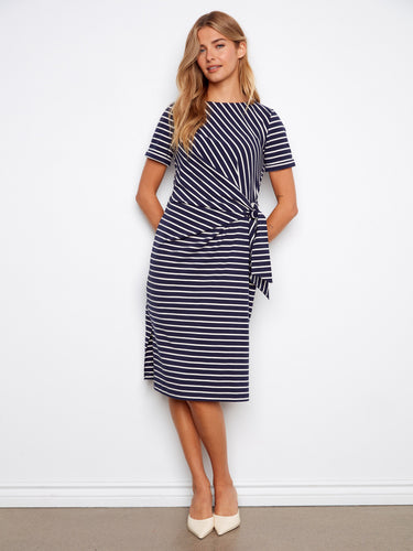 Navy striped dress with a chic boat neckline, showcasing its elegant design and style by Charlie B.
