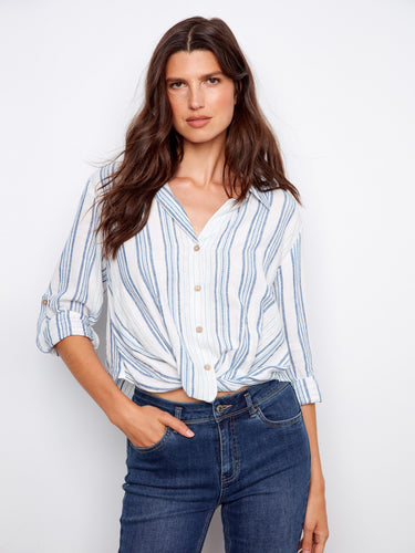 Stylish front twist detail enhances the look of this blue and white striped shirt by Charlie B.