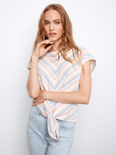 Striped top featuring a boat neckline, perfect for casual outings. The soft colors add a touch of elegance to any ensemble by Charlie B.