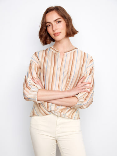 Stylish top showcasing a split notch neckline, enhancing its modern appeal and comfort. Ideal for any occasion by Charlie B.