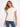 This top features a classic crew neck design, offering a timeless and versatile look for any occasion. By Charlie B.