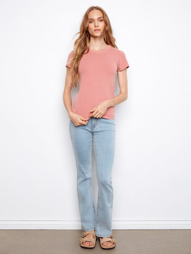 This carnation T-shirt features a semi-fitted design with ribbed detailing for a modern, comfortable fit by Charlie B.