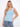 Light blue tank top featuring a scoop neckline, perfect for casual wear. Designed with comfort in mind by Charlie B.