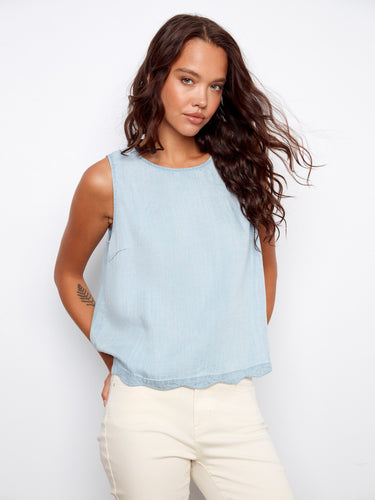 The scallop hem detail enhances the feminine look of this chic sleeveless top, ideal for versatile styling by Charlie B.