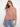 This top features a loose fit, offering comfort and style for any occasion. Perfect for pairing with jeans or skirts. By Charlie B.