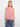 Pink sleeveless top with a loose fit, perfect for casual outings. The scallop hem adds a playful touch to this stylish piece by Charlie B.