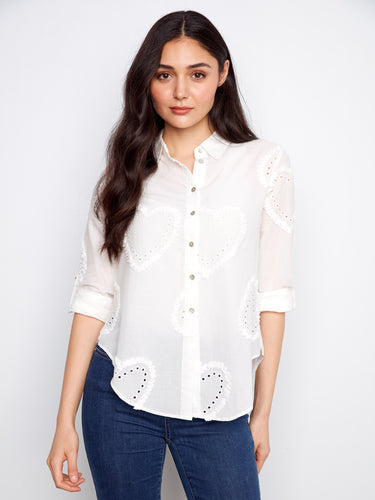 This shirt features a classic shirt collar, enhancing its elegant look. Crafted with precision and style by Charlie B.
